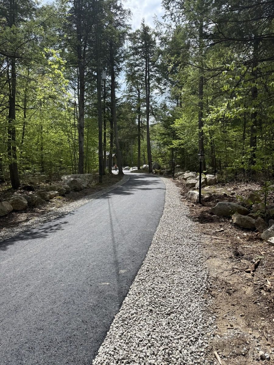 Driveway finished with stone-edged shoulders
